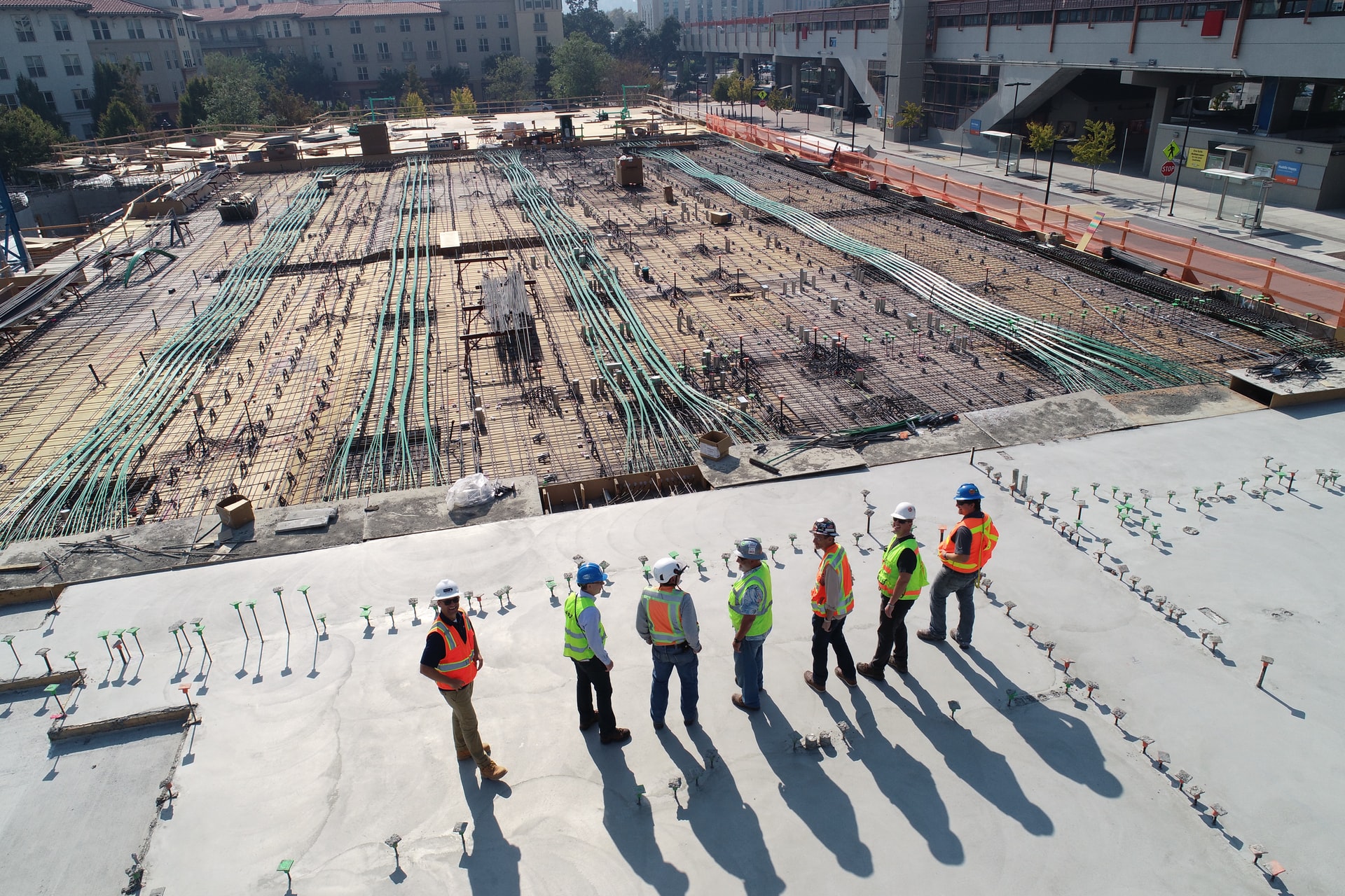 construction site with cables and workers